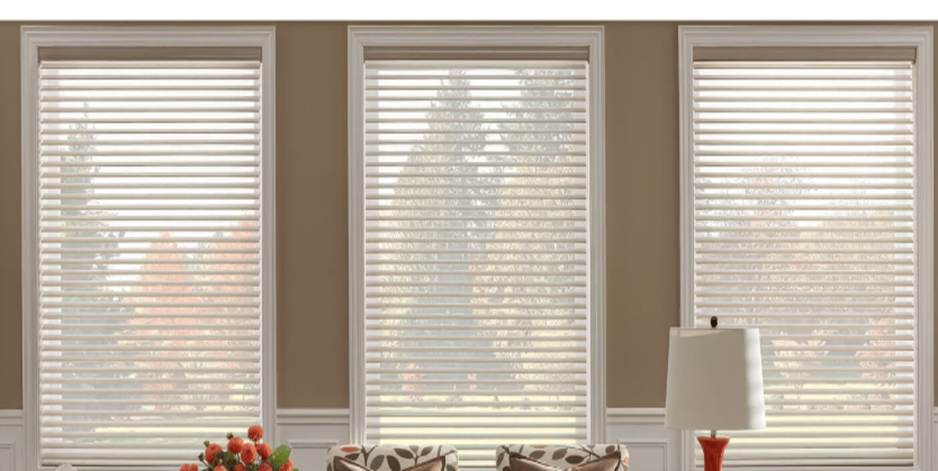 A window with blinds in a room