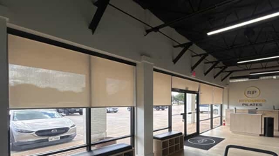 light filtering roller shades to a Pilates studio to add privacy and shade from the sun