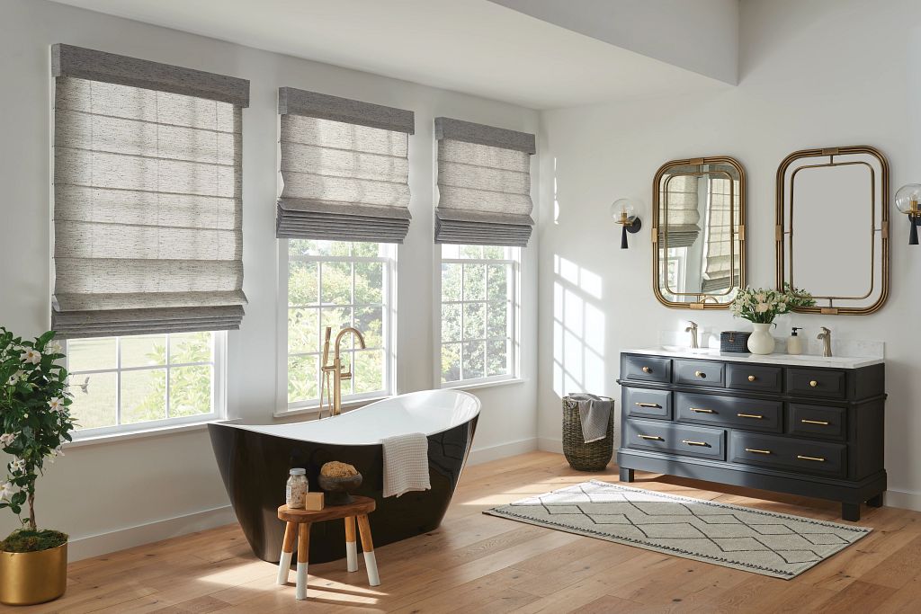 Bright Bathroom with Layered Roman Shades and Contemporary Fixtures