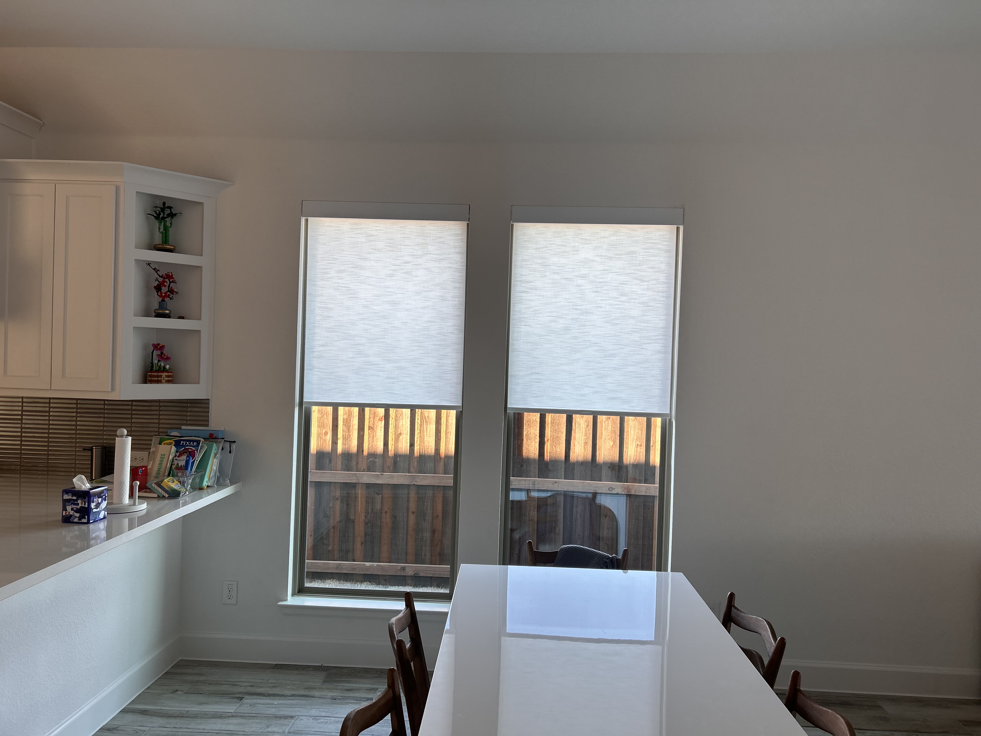Kitchen dining room with light filtering shades